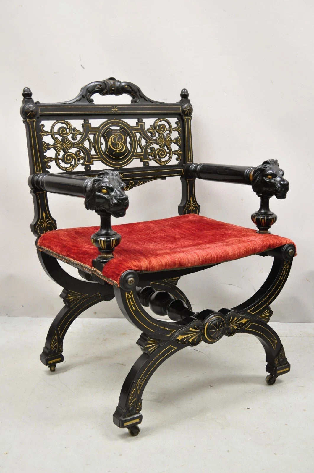 Antique Victorian Aesthetic Movement Ebonized Curule Throne Arm Chair with Lions