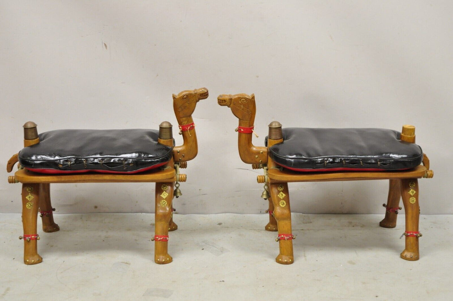 Vintage Camel Saddle Stools Carved Wood Black/Red Cushions - a Pair