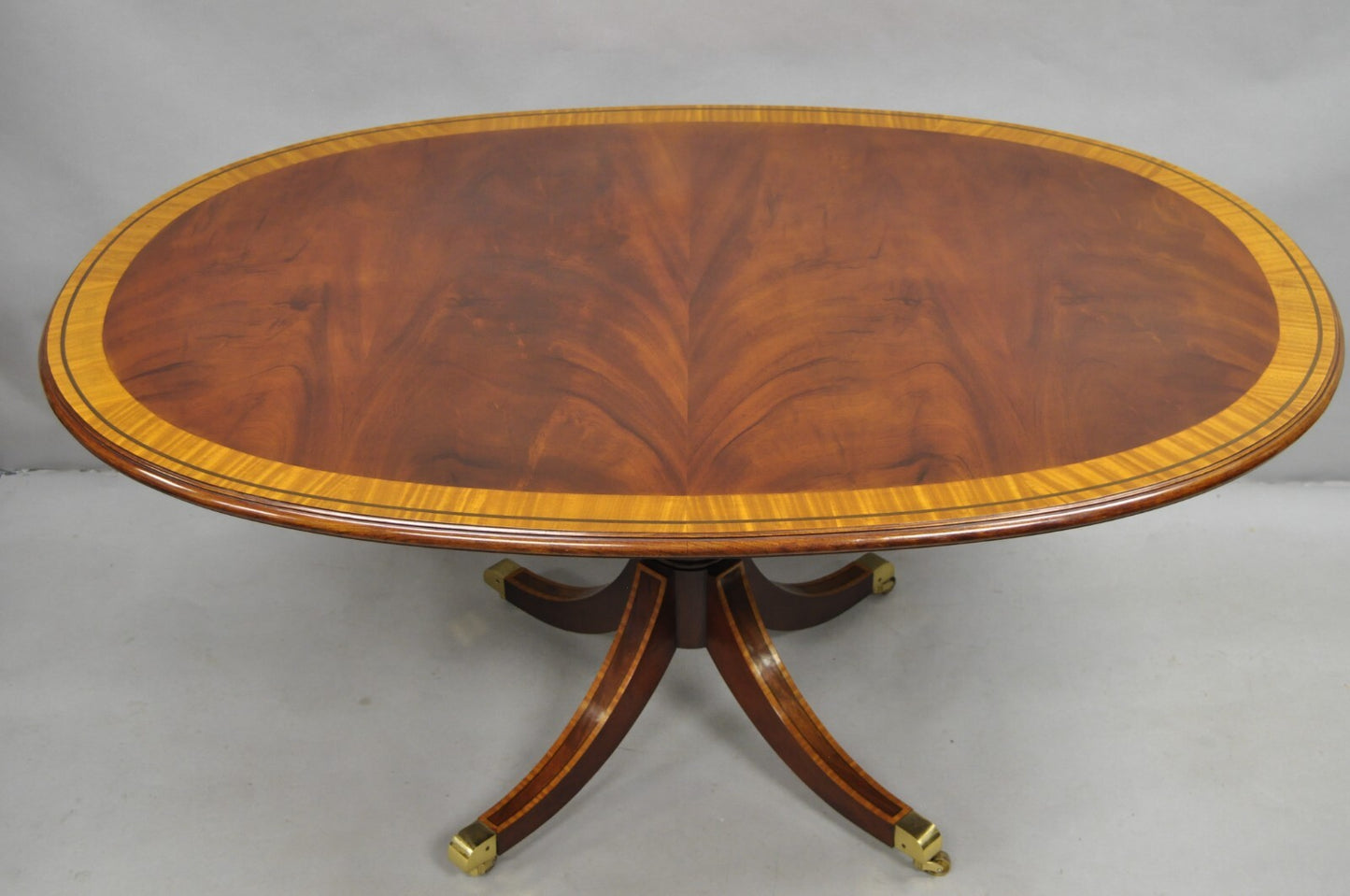Karges English Duncan Phyfe Satinwood Banded Crotch Mahogany Oval Dining Table