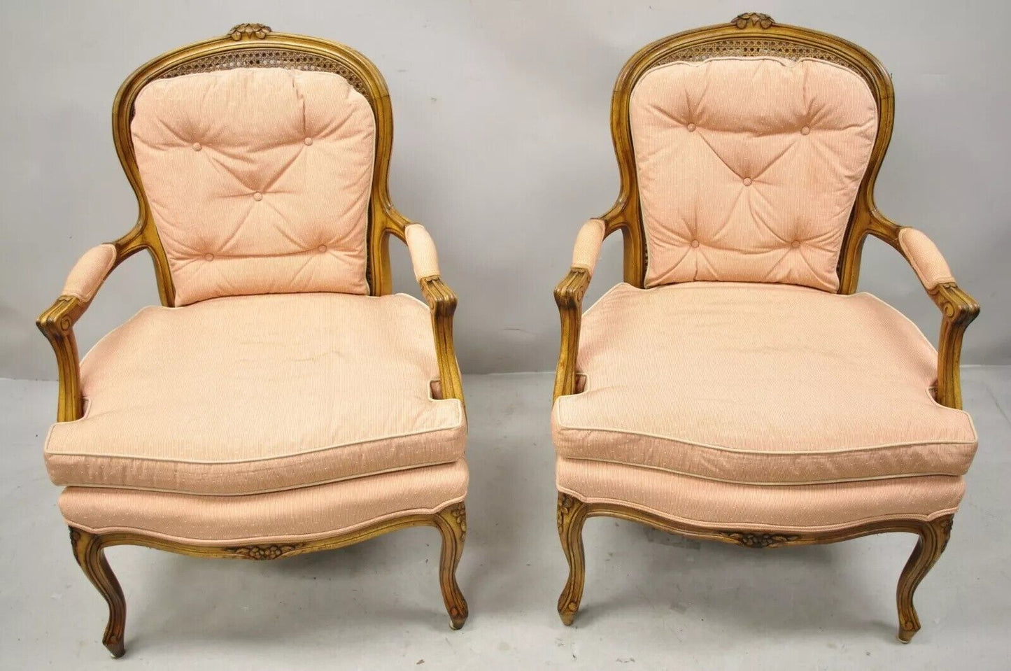 French Louis XV Provincial Style Carved Walnut Cane Back Arm Chairs - a Pair