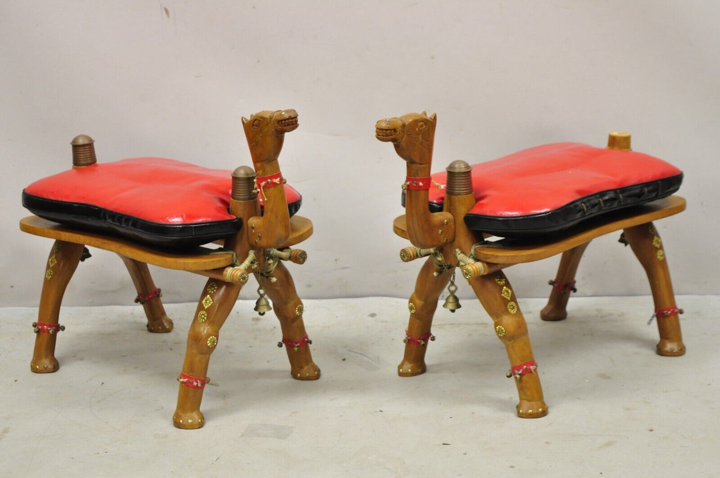 Vintage Camel Saddle Stools Carved Wood Black/Red Cushions - a Pair