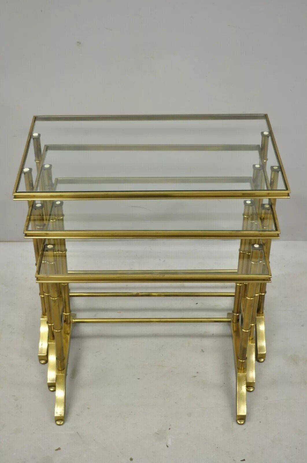 Mastercraft Hollywood Regency Brass Faux Bamboo Glass Top Nesting Side Tables