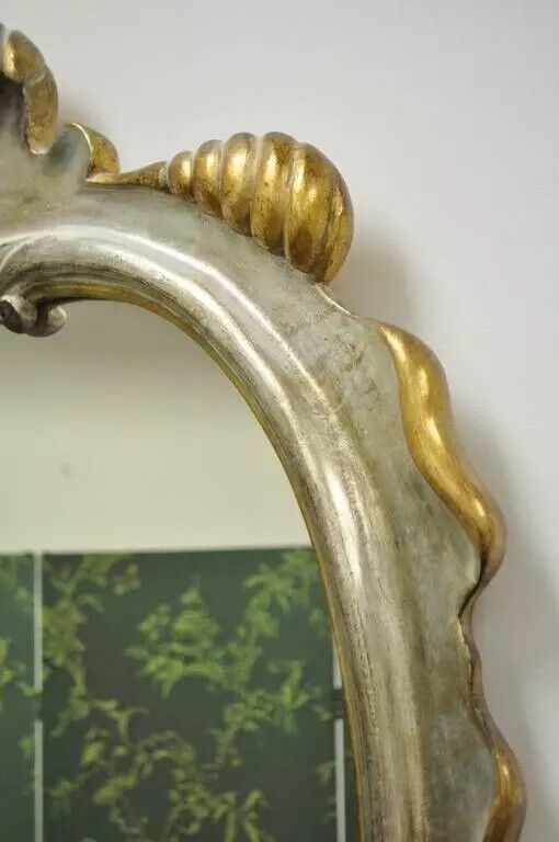 Italian Hollywood Regency Gold and Silver Giltwood Scroll Carved Wall Mirror