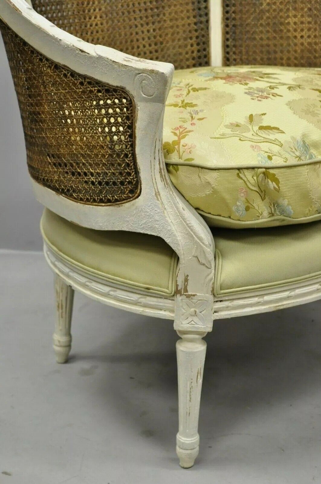 French Louis XVI Style White Distress Painted Cane Bergere Club Chairs - a Pair