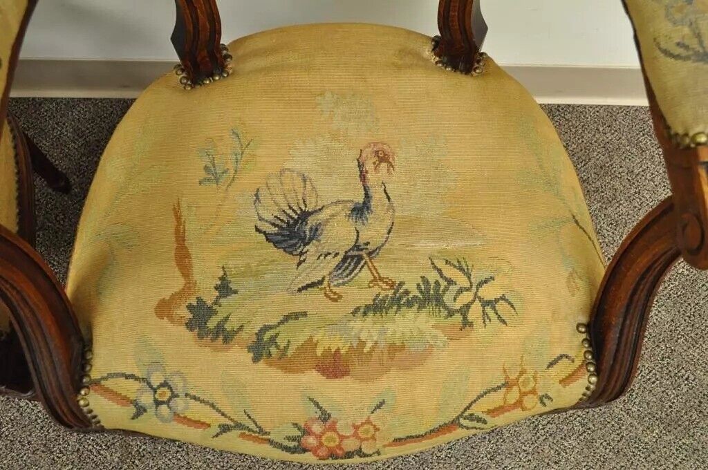19th C. French Louis XVI Style Carved Walnut Needlepoint Arm Chairs - a Pair