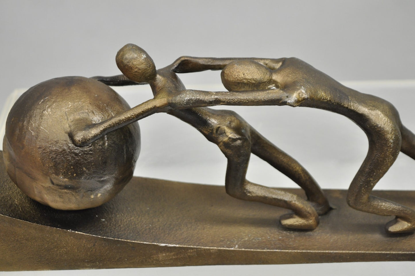 Modern Abstract Brutalist Cast Metal Sculpture Figures Pushing Boulder up Hill