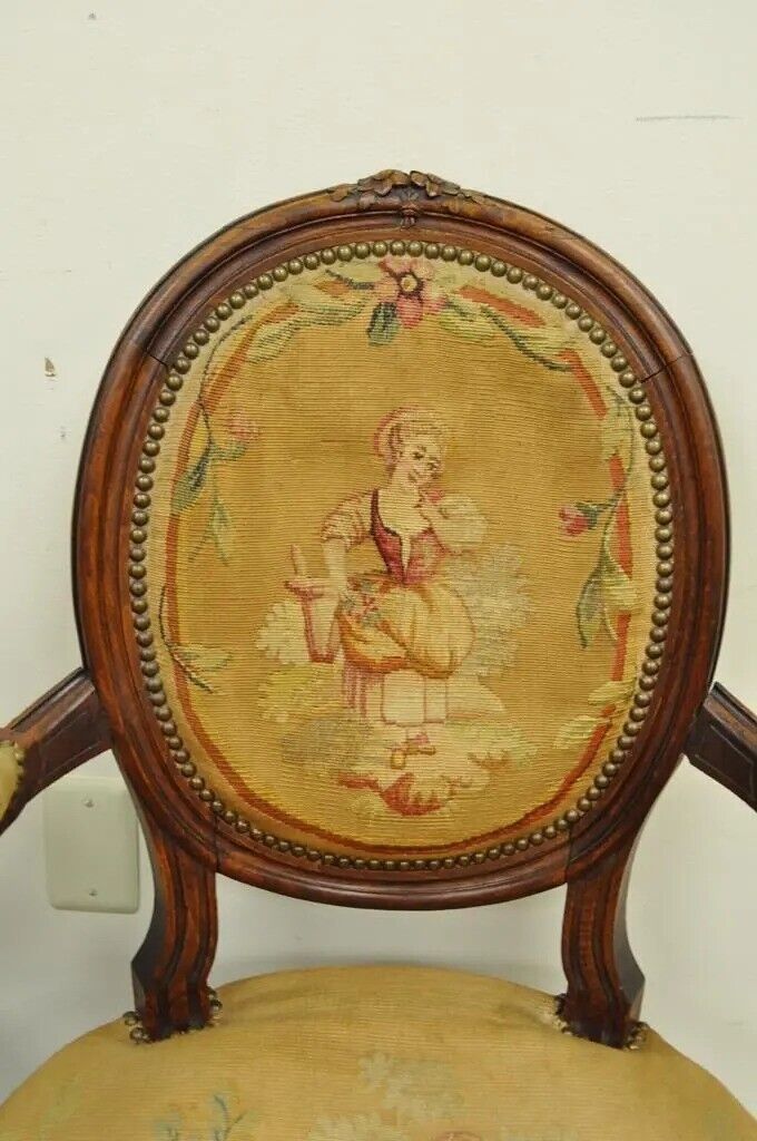 19th C. French Louis XVI Style Carved Walnut Needlepoint Arm Chairs - a Pair