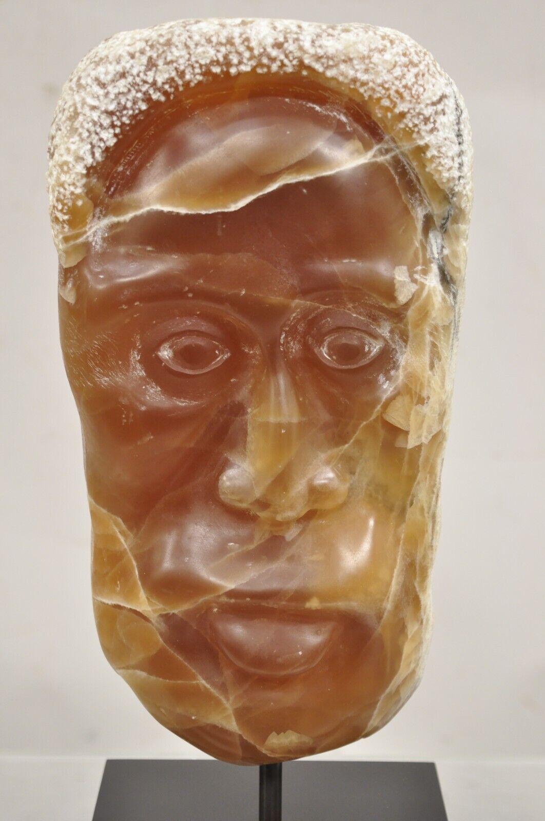 Sheryl C. Benjamin " Indian Trail " Carved Brown Onxy Male Face Sculpture