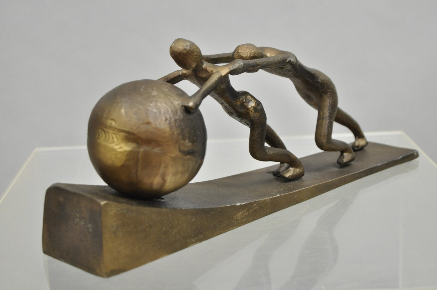 Modern Abstract Brutalist Cast Metal Sculpture Figures Pushing Boulder up Hill