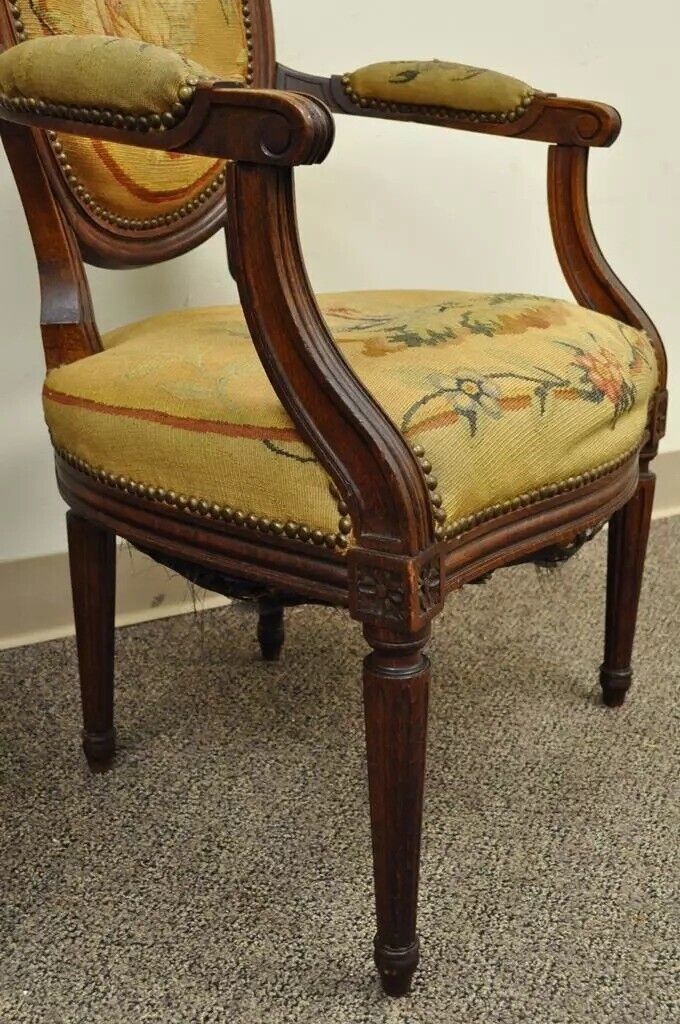 19th C. French Louis XVI Style Carved Walnut Needlepoint Arm Chairs - a Pair
