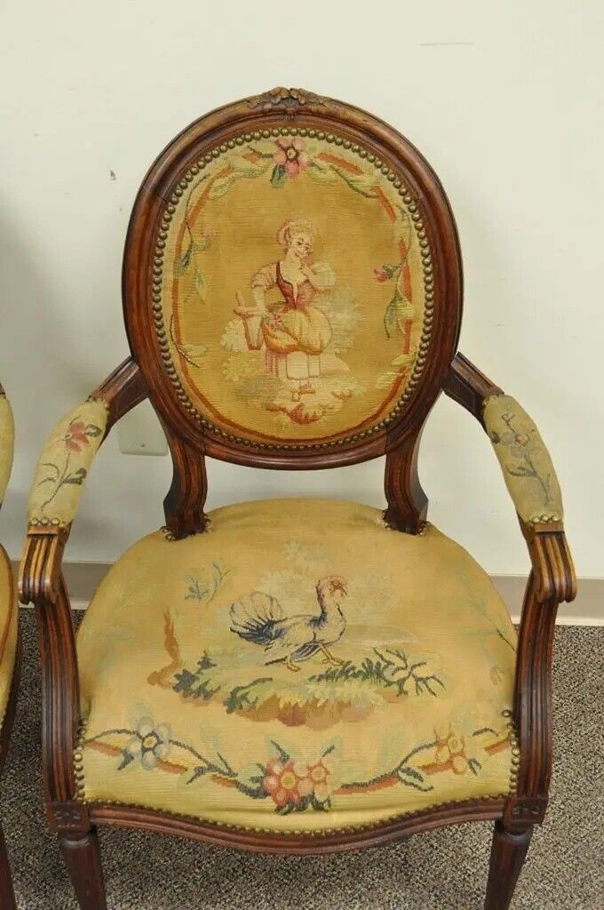 19th C. French Louis XVI Style Carved Walnut Needlepoint Arm Chairs - a Pair