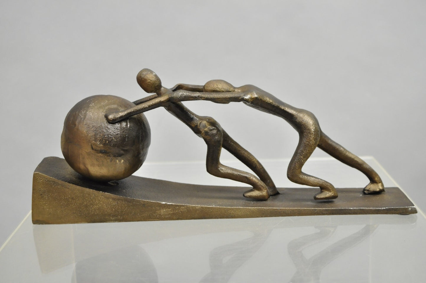 Modern Abstract Brutalist Cast Metal Sculpture Figures Pushing Boulder up Hill