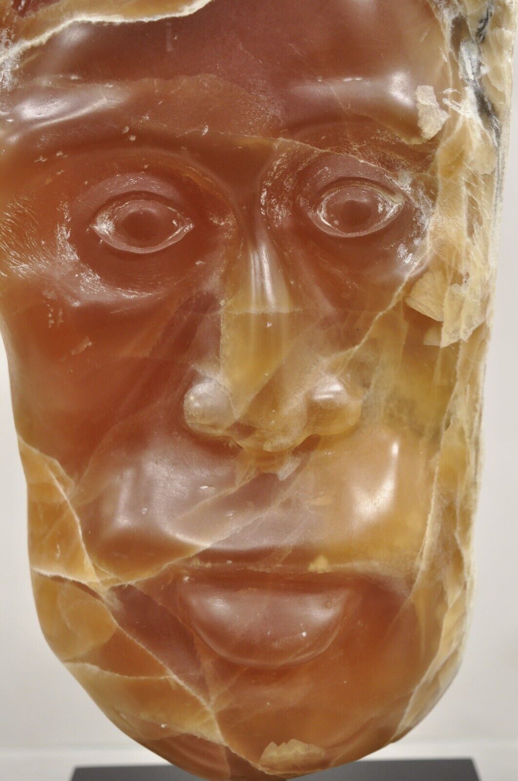 Sheryl C. Benjamin " Indian Trail " Carved Brown Onxy Male Face Sculpture