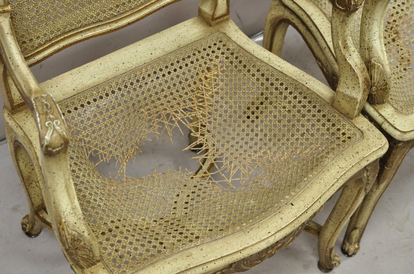 French Louis XV Style Cream Painted Carved Wood Cane Fauteuil Arm Chairs - Pair
