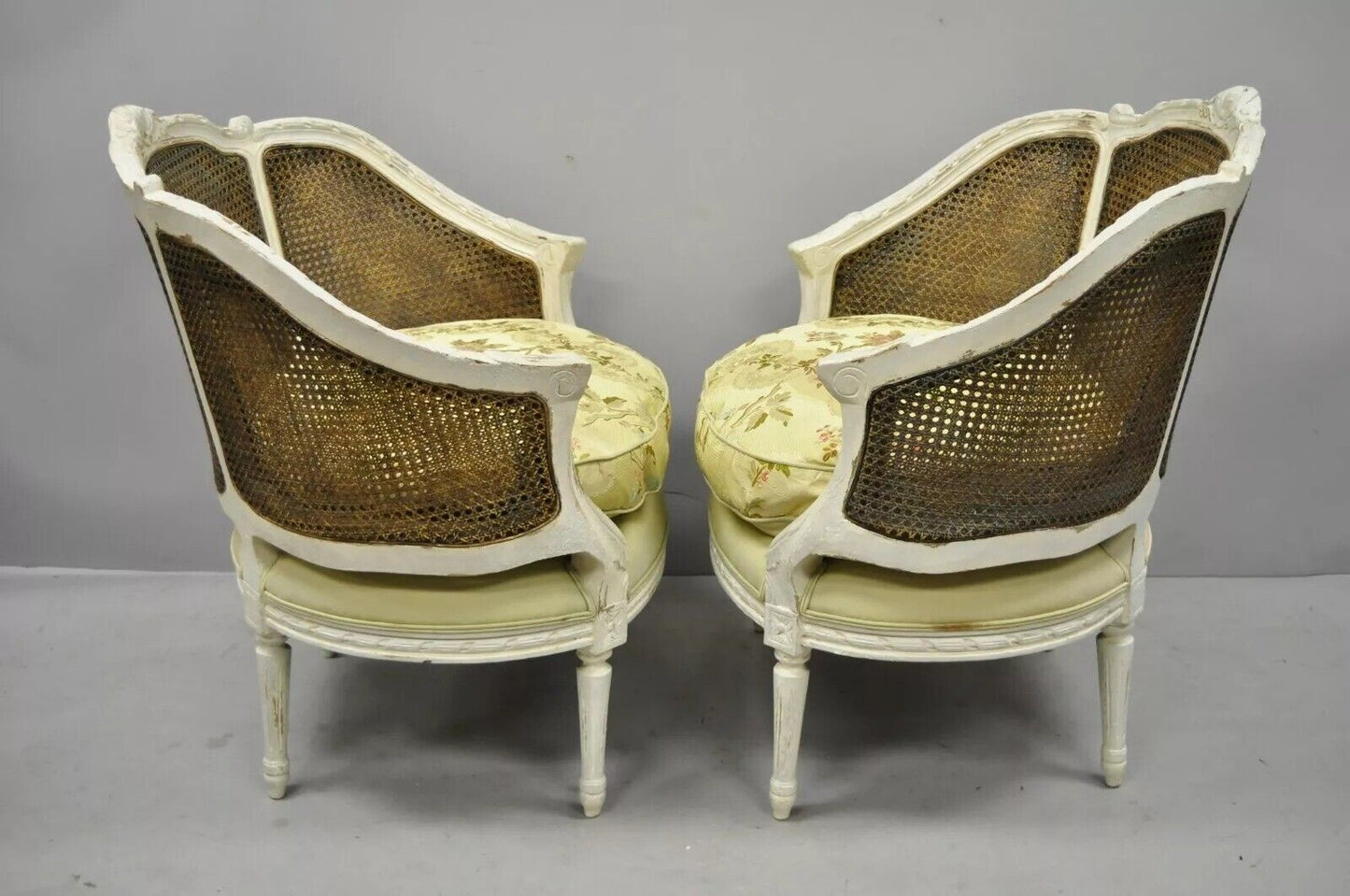 French Louis XVI Style White Distress Painted Cane Bergere Club Chairs - a Pair