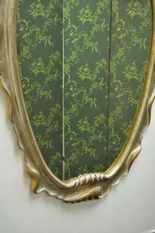 Italian Hollywood Regency Gold and Silver Giltwood Scroll Carved Wall Mirror