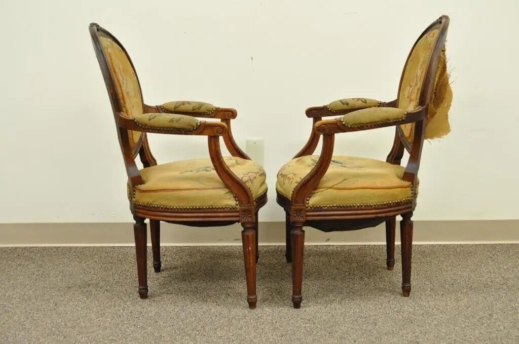 19th C. French Louis XVI Style Carved Walnut Needlepoint Arm Chairs - a Pair