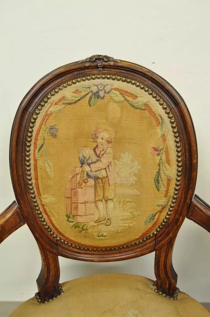 19th C. French Louis XVI Style Carved Walnut Needlepoint Arm Chairs - a Pair