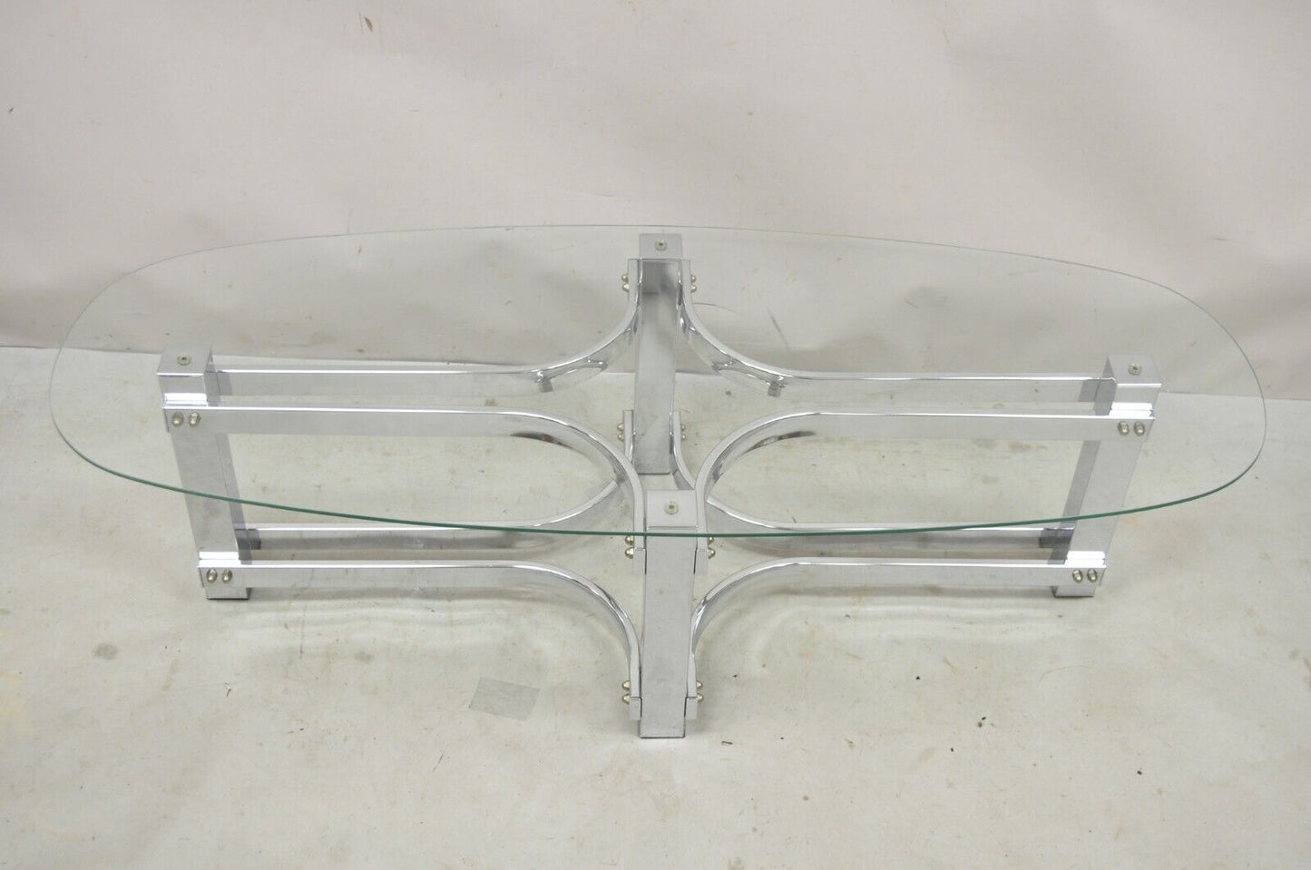 Vintage Mid Century Modern Oval Glass Top Sculptural Chrome Frame Coffee Table