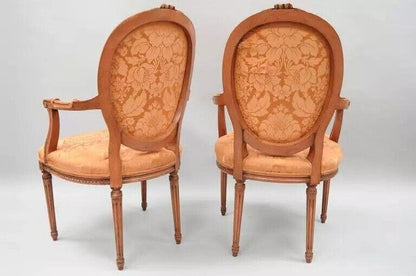 French Louis XVI Style Pink Distress Painted Oval Back Dining Arm Chairs - Pair