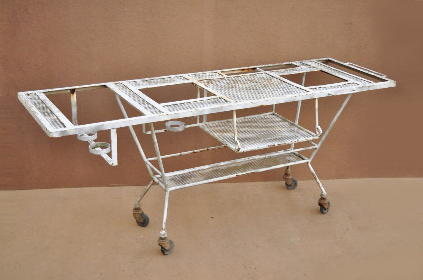 Vintage Mid Century Modern Wrought Iron Metal Mesh Rolling Bar Cart Table