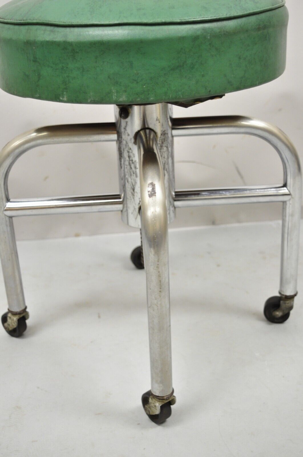 Antique American Industrial Metal Green Vinyl Rolling Work Stool Seat