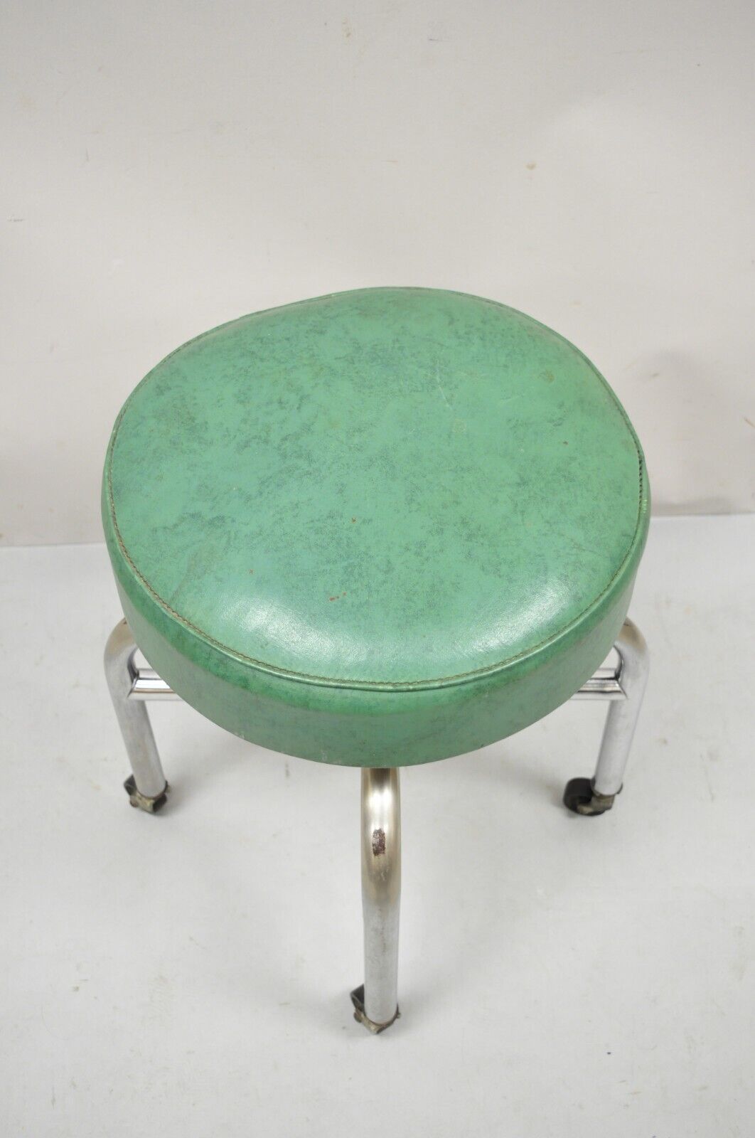 Antique American Industrial Metal Green Vinyl Rolling Work Stool Seat