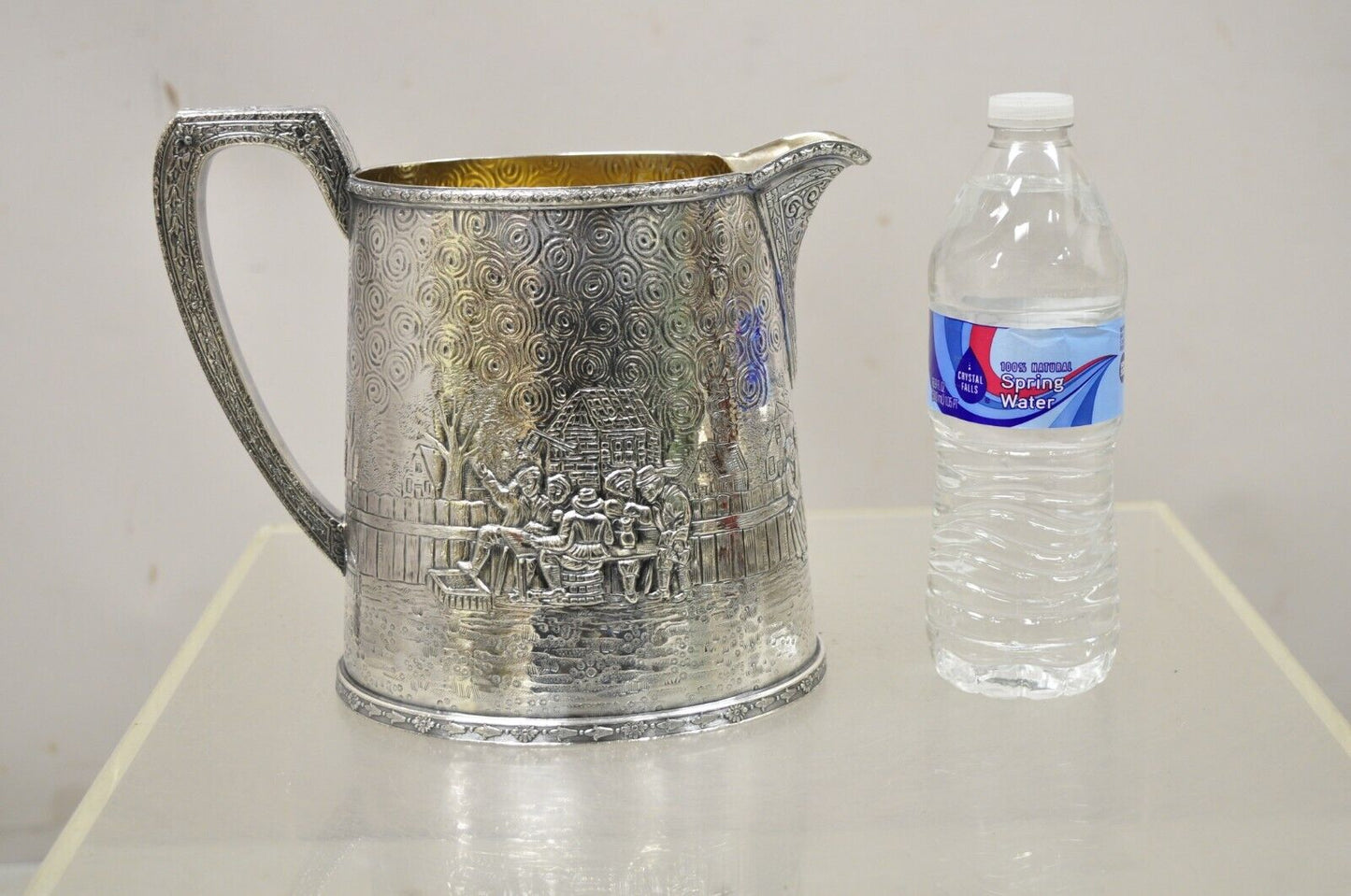 Derby S.P. Co International Figural Repousse Village Silverplate Water Pitcher