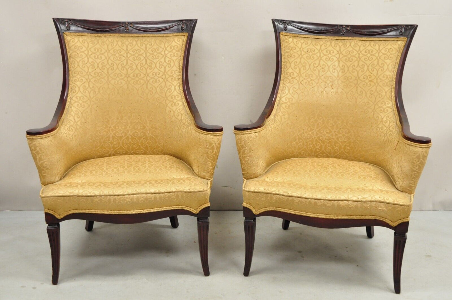 Vintage Hollywood Regency Drape Carved Mahogany Fireside Lounge Chairs - a Pair