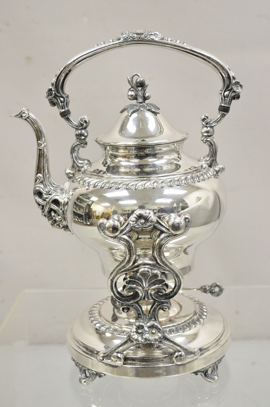 Vintage Art Nouveau Silver Plated Floral Repousse Tilting Tea Pot on Stand