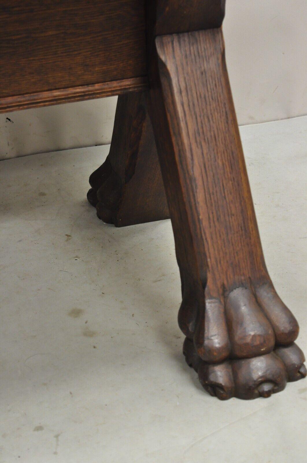 Antique English Renaissance Oak Wood Trestle Sawbuck Dining Table with Paw Feet