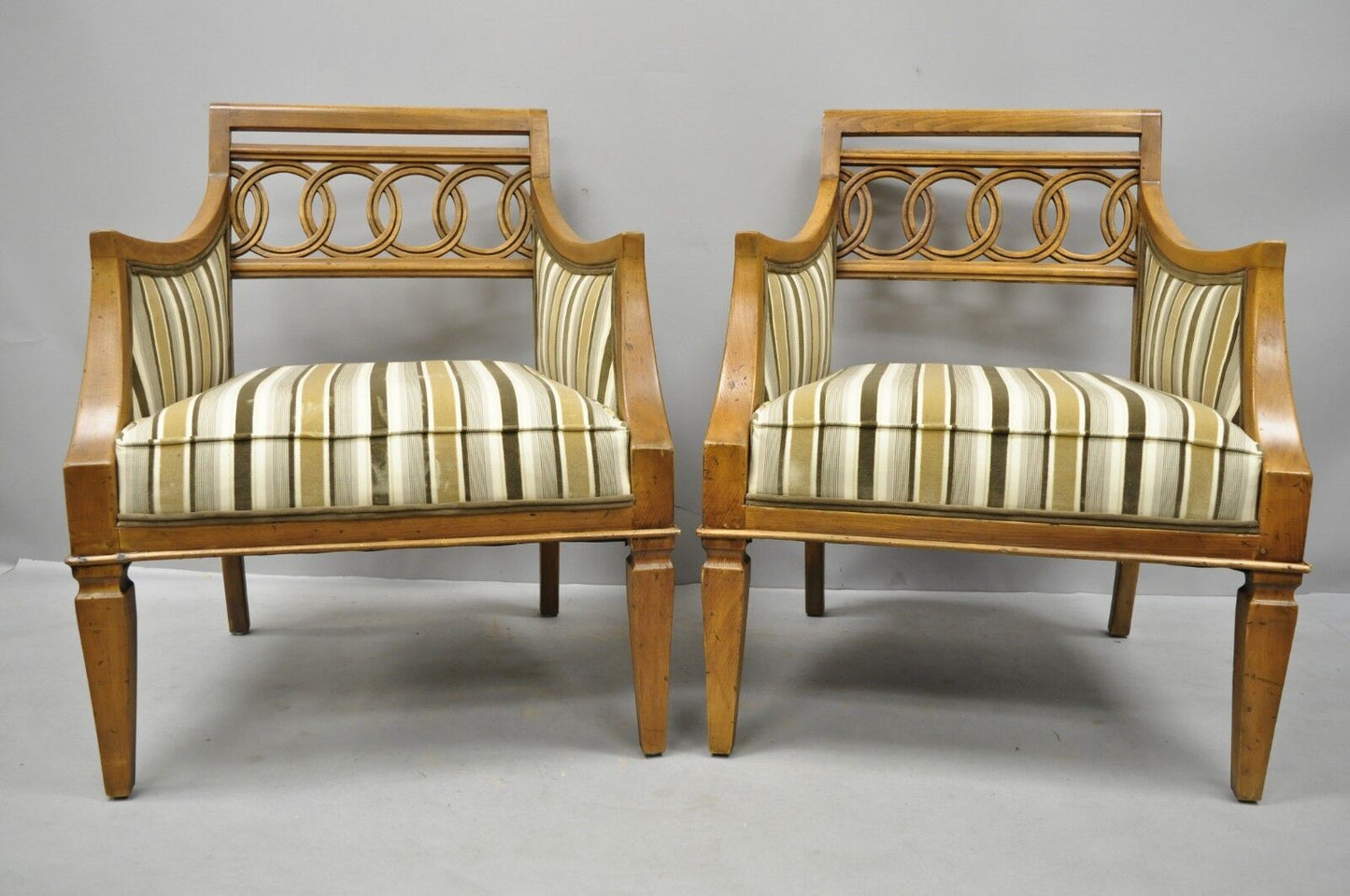 Vintage Hollywood Regency Interlocking Spiral Carved Wood Lounge Chairs - a Pair