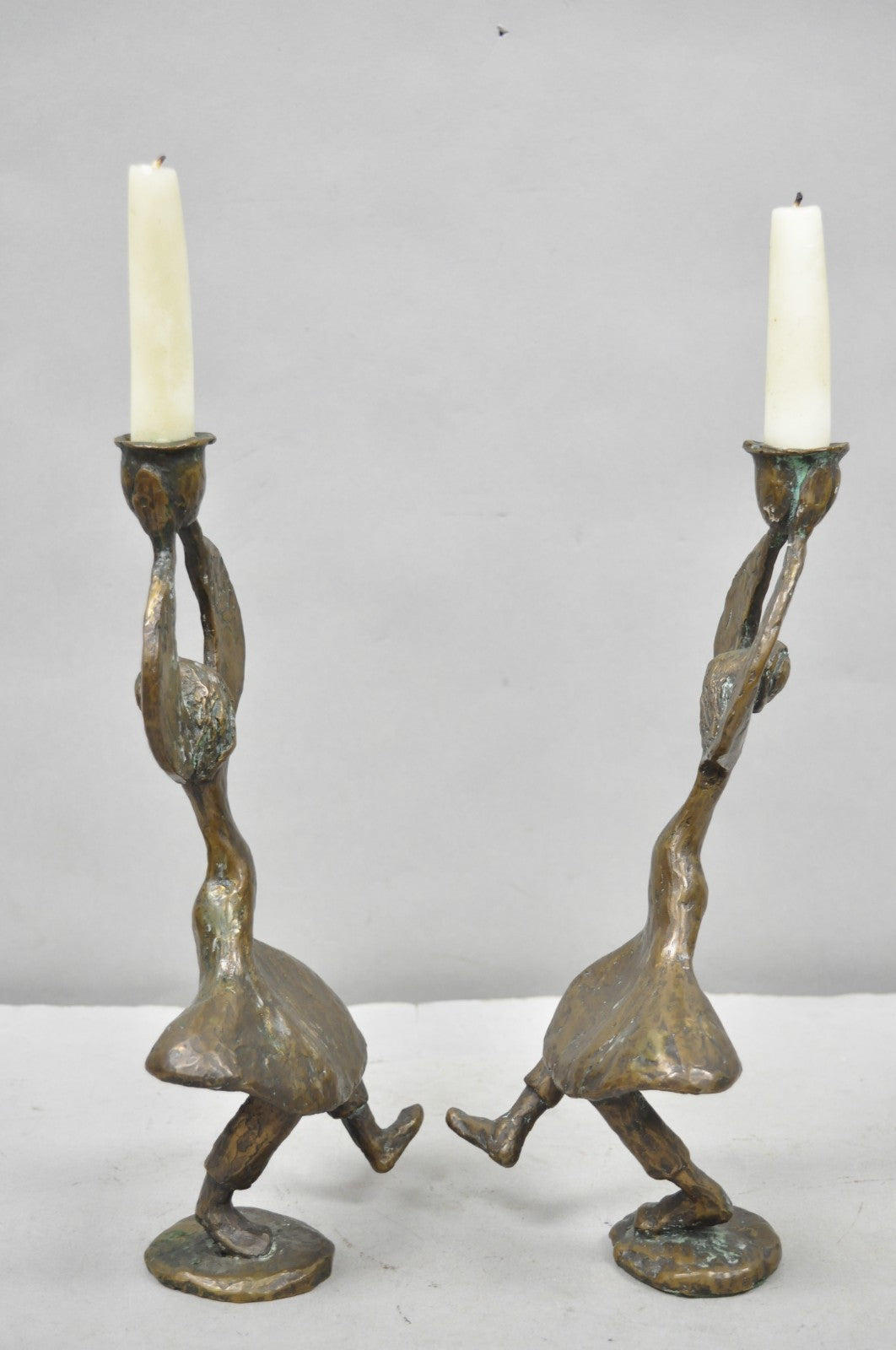 Vintage Brutalist Bronze Figural Dancing Rabbi Judaica Candlesticks - a Pair