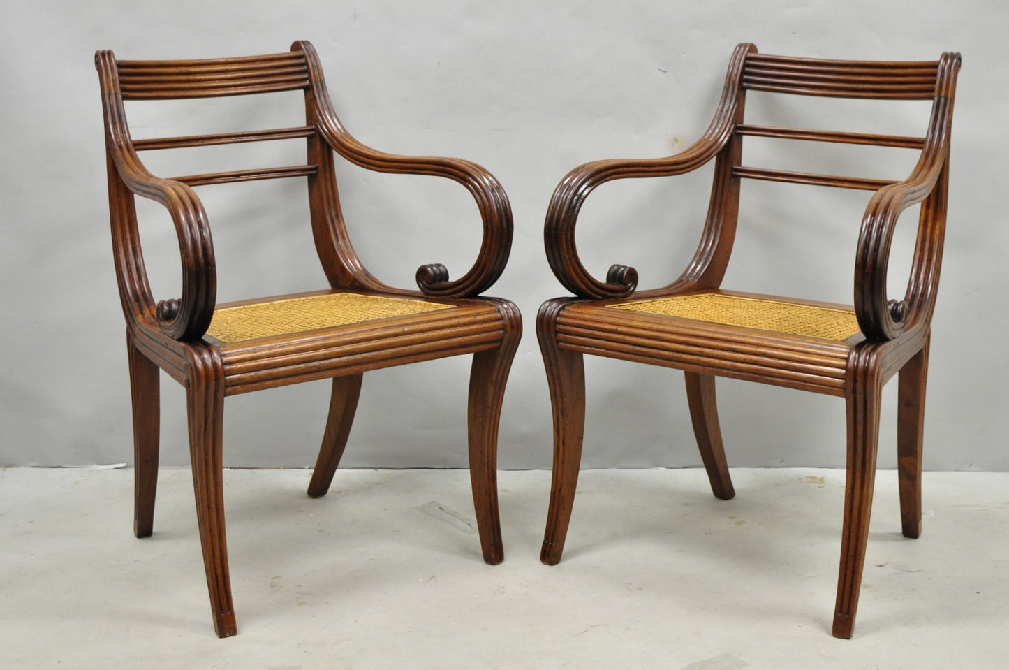 Vintage English Regency Style Cane Seat Mahogany Saber Leg Arm Chairs - a Pair