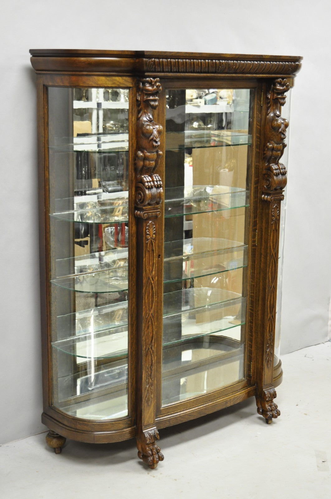 Antique American Empire Tiger Oak Curved Glass China Cabinet w/ Carved Griffins