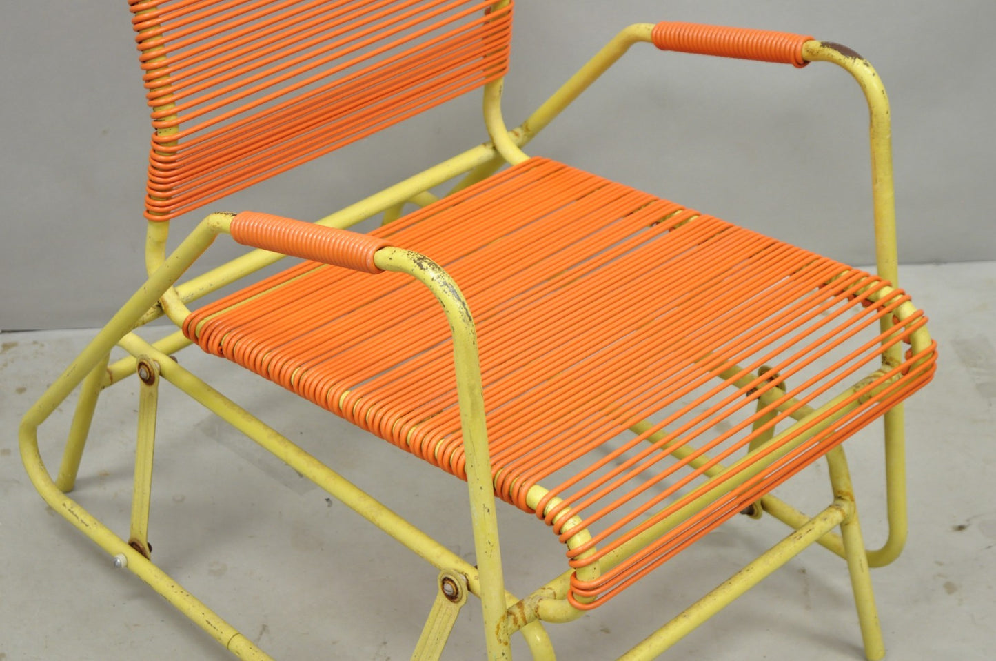 Vintage Mid Century Modern Orange Vinyl Spaghetti Strap Glider Lounge Chair