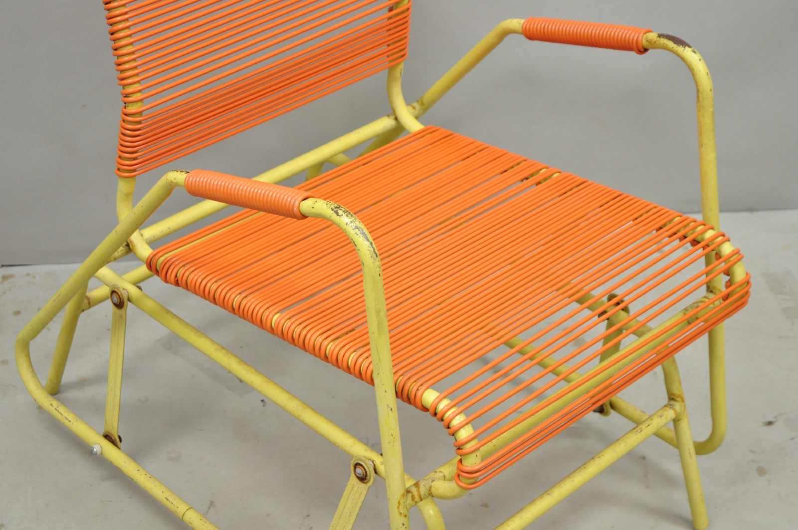 Vintage Mid Century Modern Orange Vinyl Spaghetti Strap Glider Lounge Chair