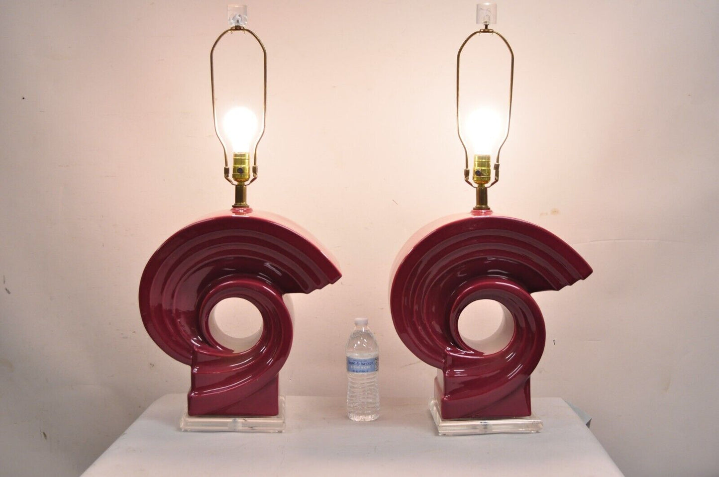 Vintage Postmodern Cranberry Red Sculptural Snail Scroll Ceramic Table Lamp Pair