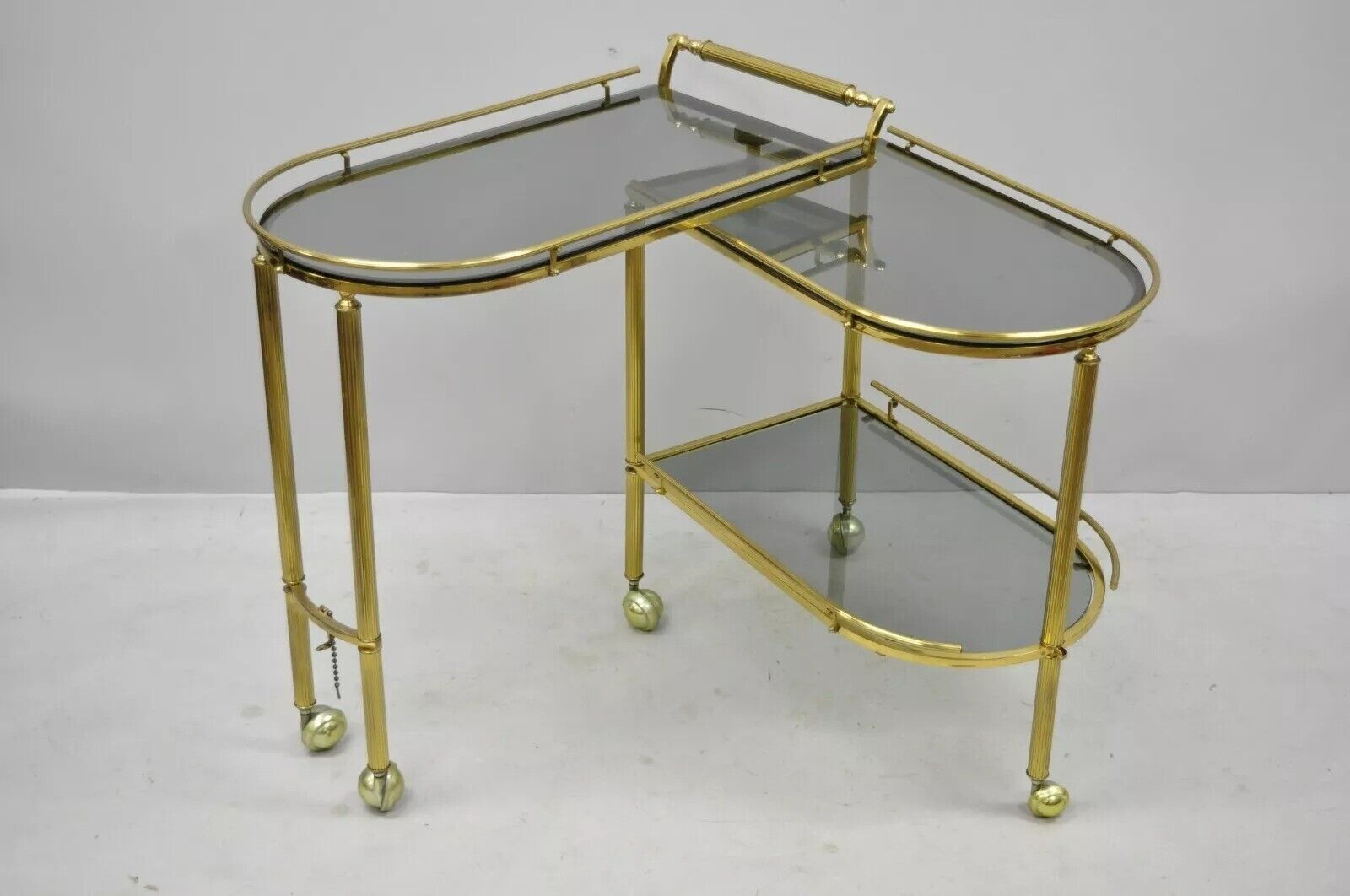 Italian Hollywood Regency Brass Swivel Rolling Bar Cart Server with Smoked Glass