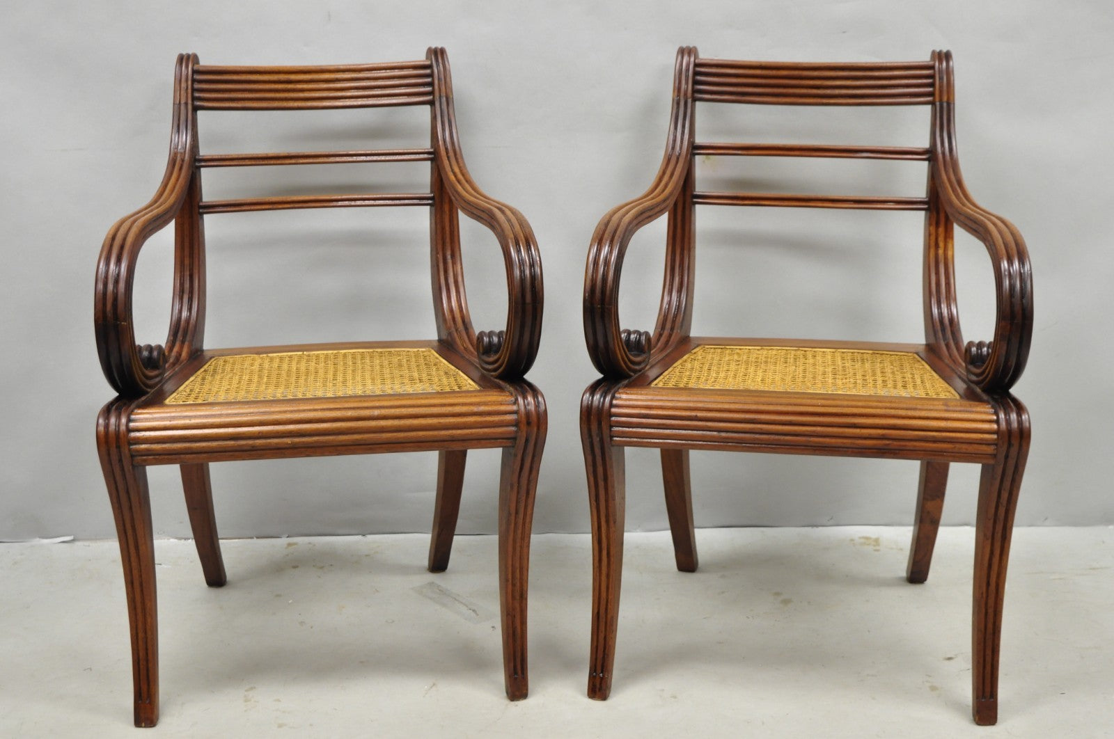 Vintage English Regency Style Cane Seat Mahogany Saber Leg Arm Chairs - a Pair