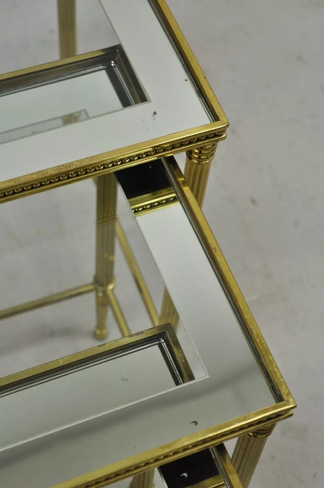 Italian Hollywood Regency Brass Mirror Glass Top Nesting Side Tables - Set 3