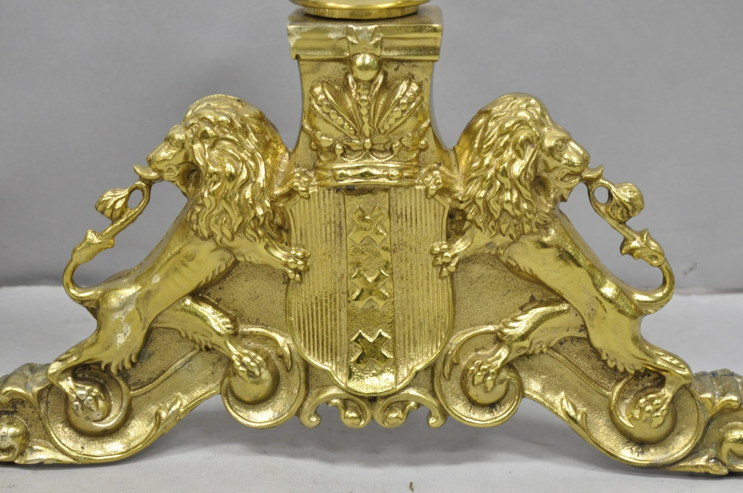 French Empire Renaissance Brass Lion Coat of Arms Cannonball Andirons - a Pair