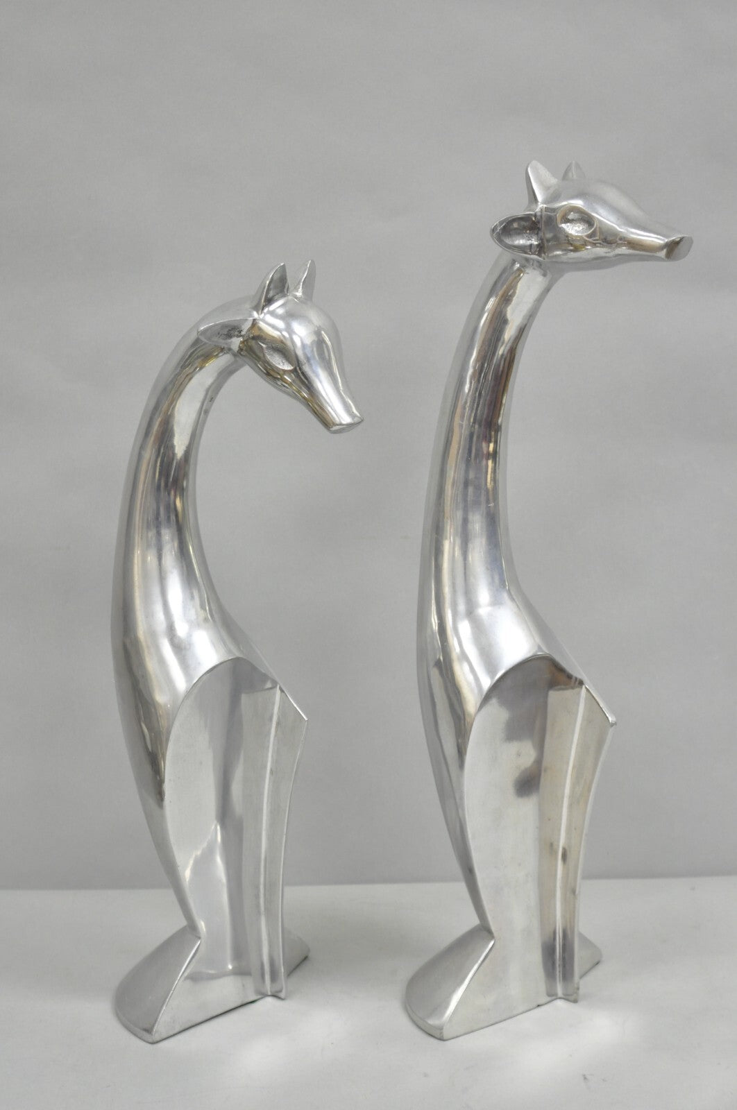 Vintage Mid Century Modern Cast Aluminum Silver Giraffe Sculptures - a Pair
