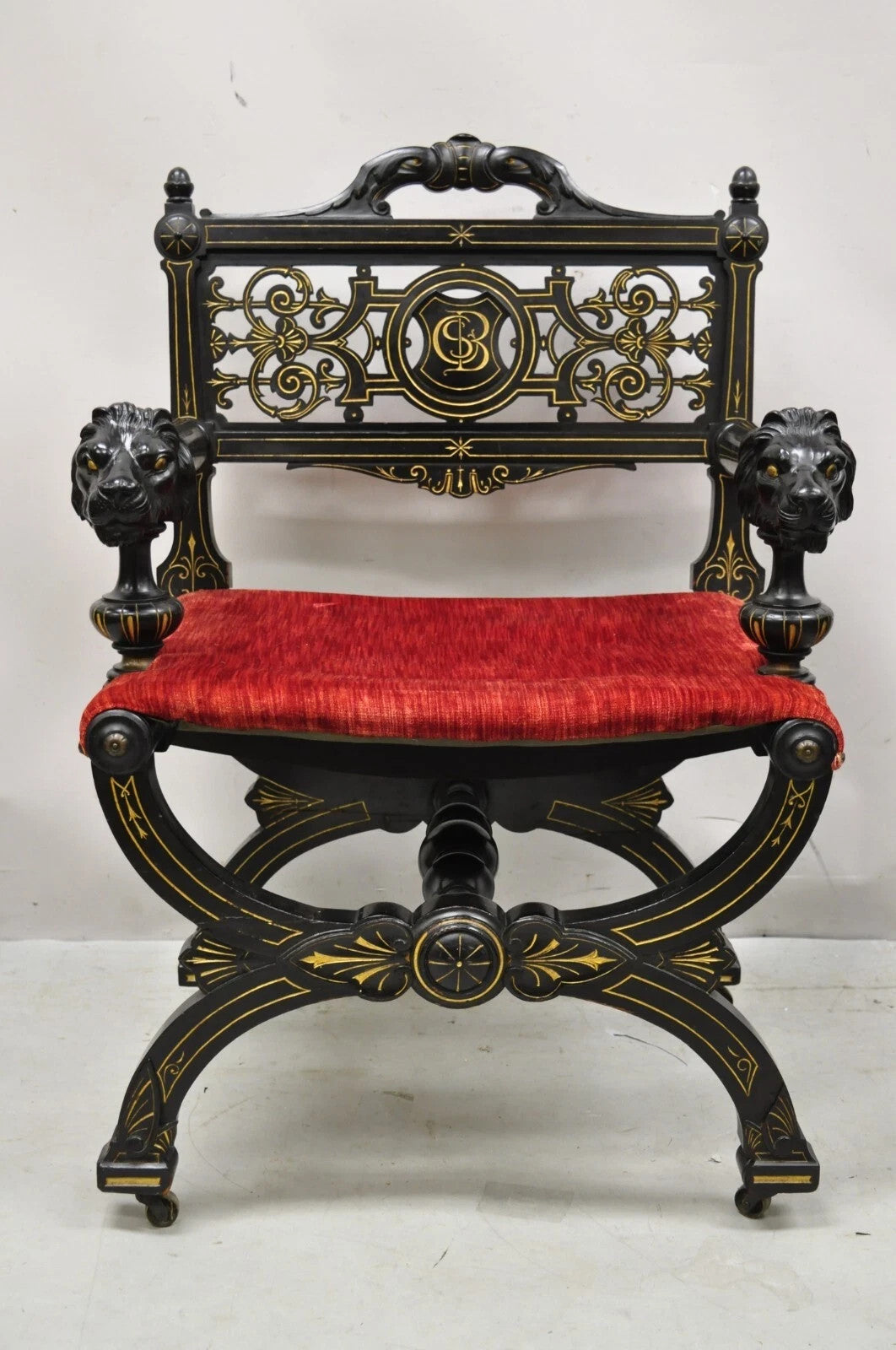 Antique Victorian Aesthetic Movement Ebonized Curule Throne Arm Chair with Lions