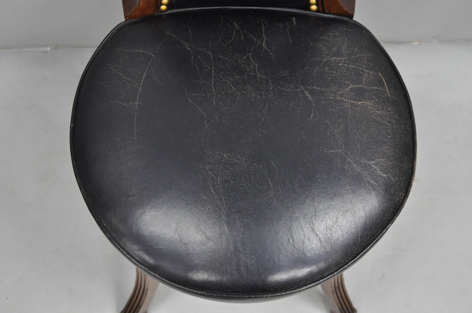 Vintage French Regency Style Carved Mahogany Black Leather Saber Leg Side Chair