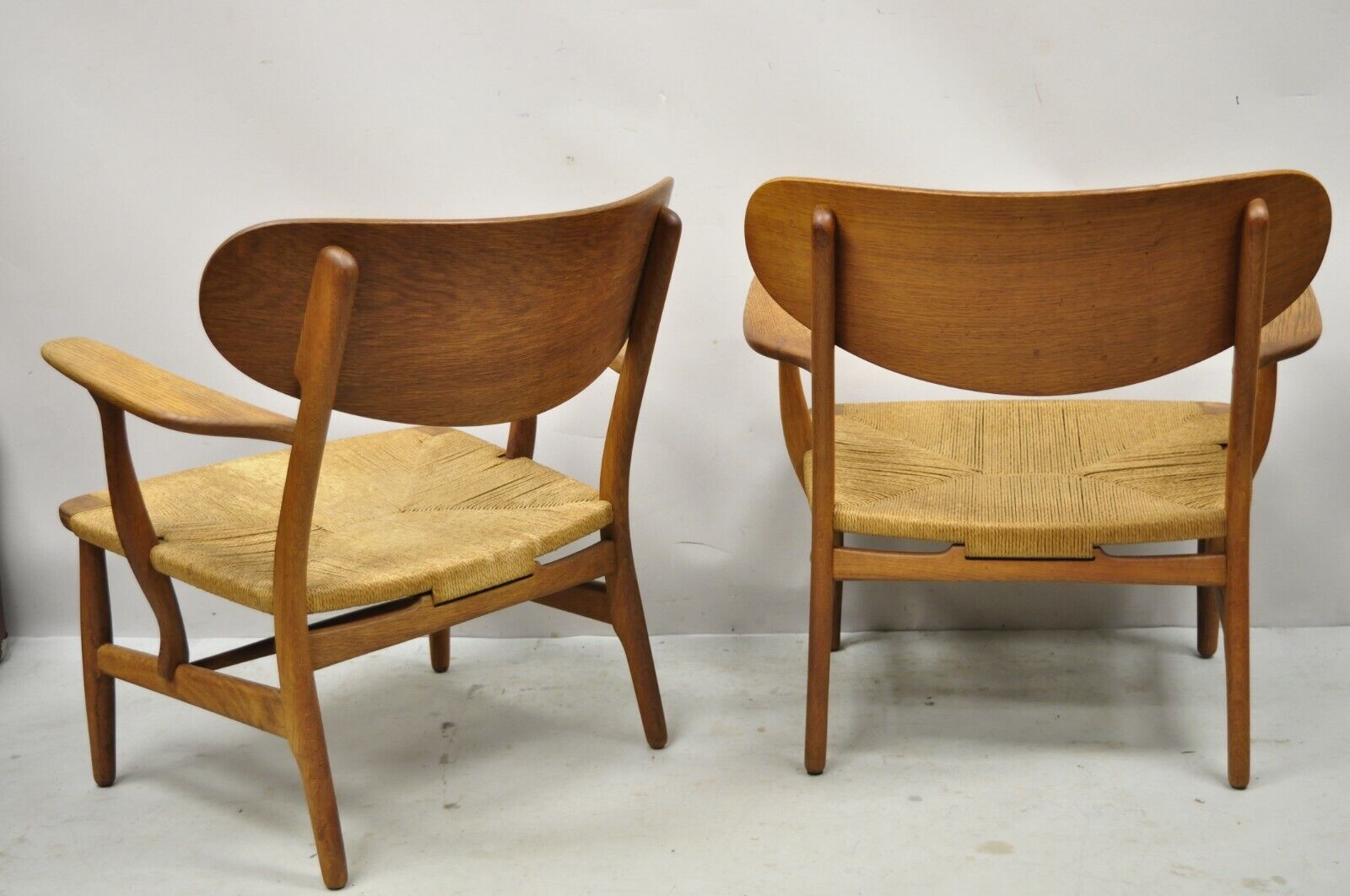 Vintage Hans Wegner CH22 Carl Hansen & Son Oak Lounge Easy Chairs MCM - a Pair