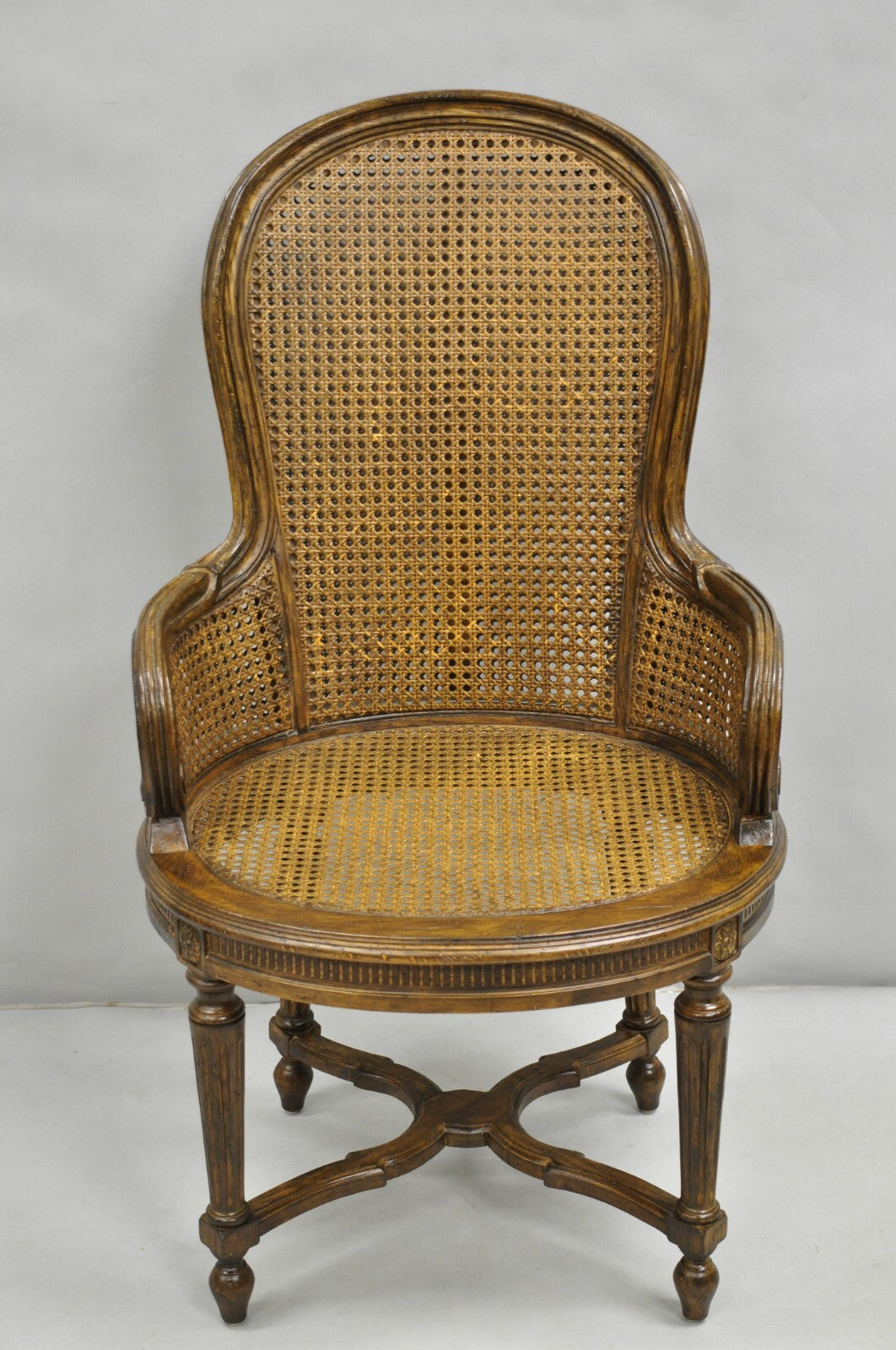 Vintage French Louis XVI Style Cane Balloon Back Walnut Arm Chairs - a Pair