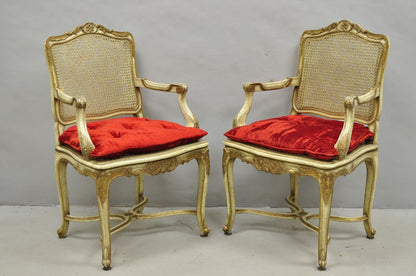 Vintage French Louis XV Style Cream Painted Carved Wood Cane Arm Chairs - a Pair