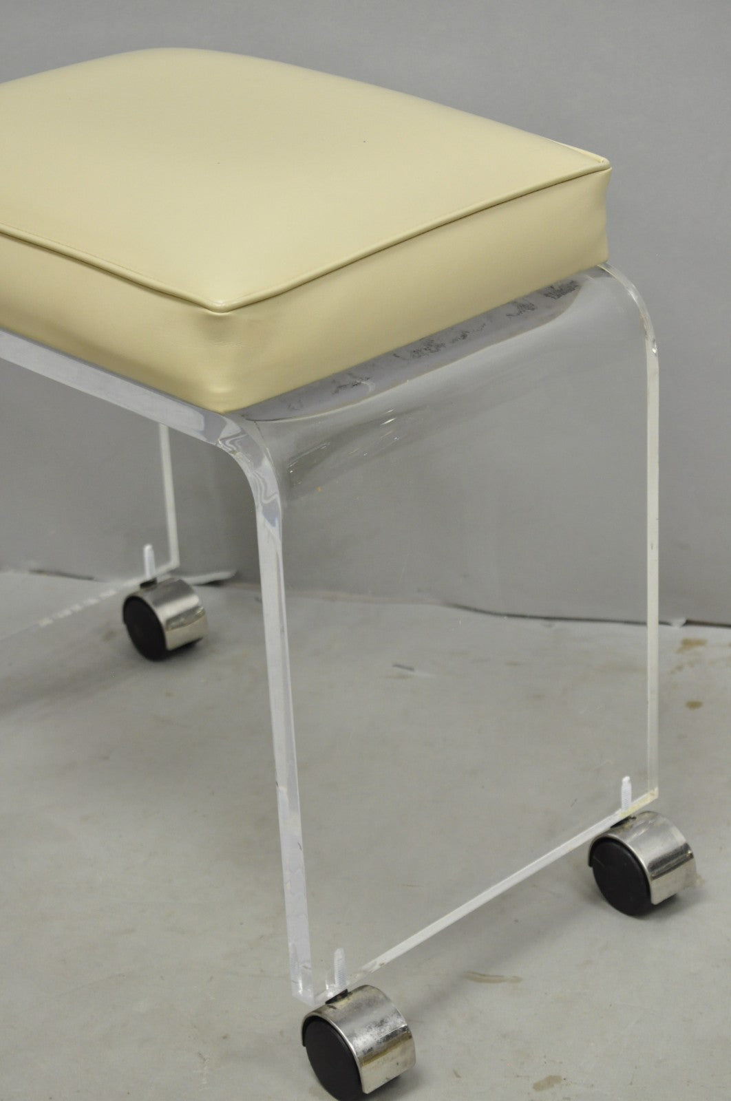 Vintage Mid Century Modern Clear Lucite Waterfall Vanity Bench Stool on Wheels