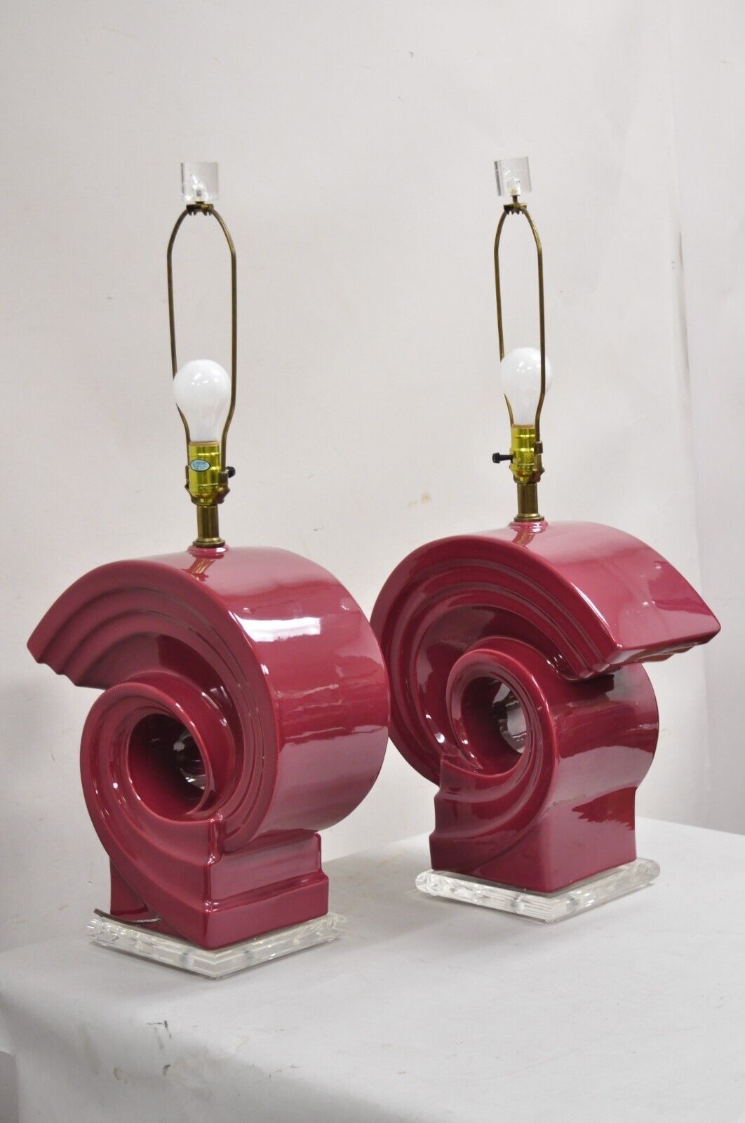 Vintage Postmodern Cranberry Red Sculptural Snail Scroll Ceramic Table Lamp Pair